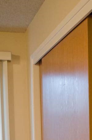 unremodeled 2x1 master closet